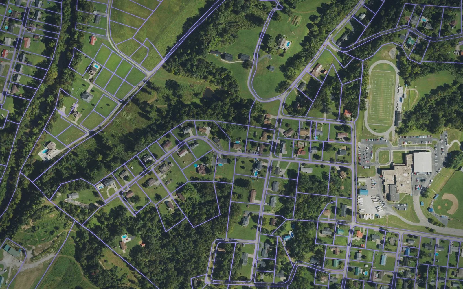 Parcel boundaries over aerial imagery of Carter County, Kentucky