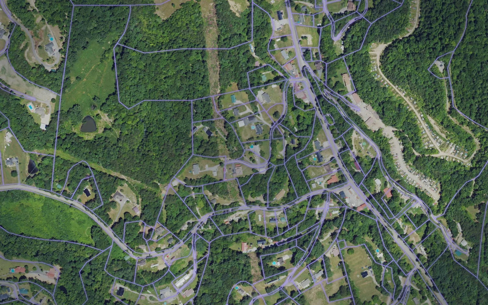 Parcel boundaries over aerial imagery of Clay County, Kentucky