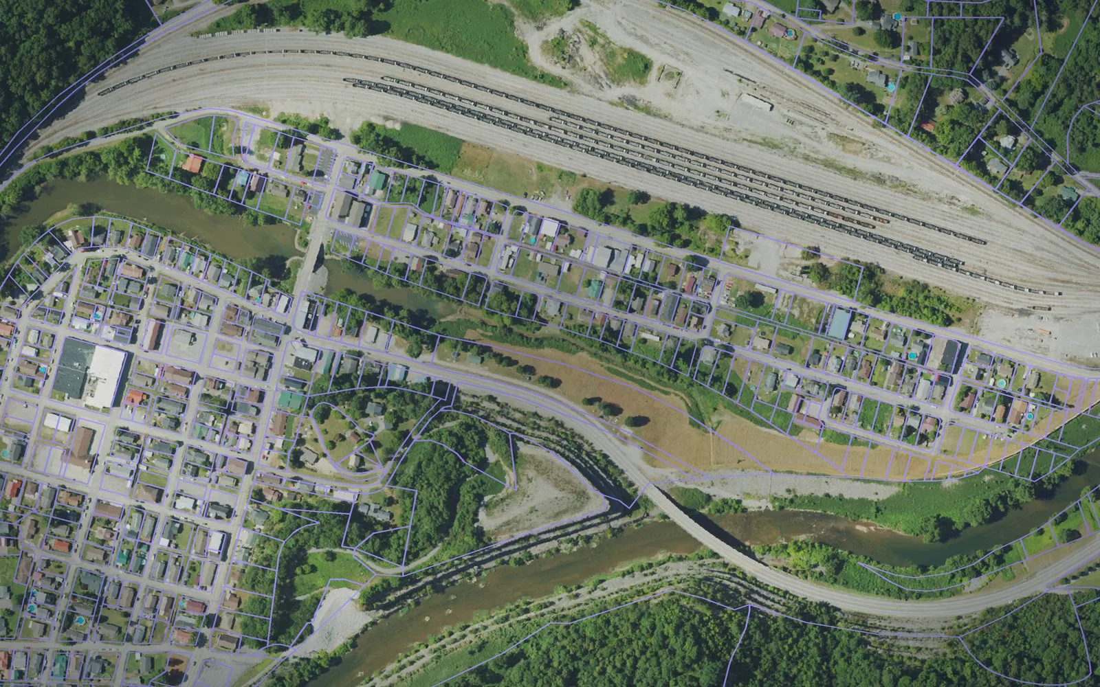 Parcel boundaries over aerial imagery of Harlan County, Kentucky