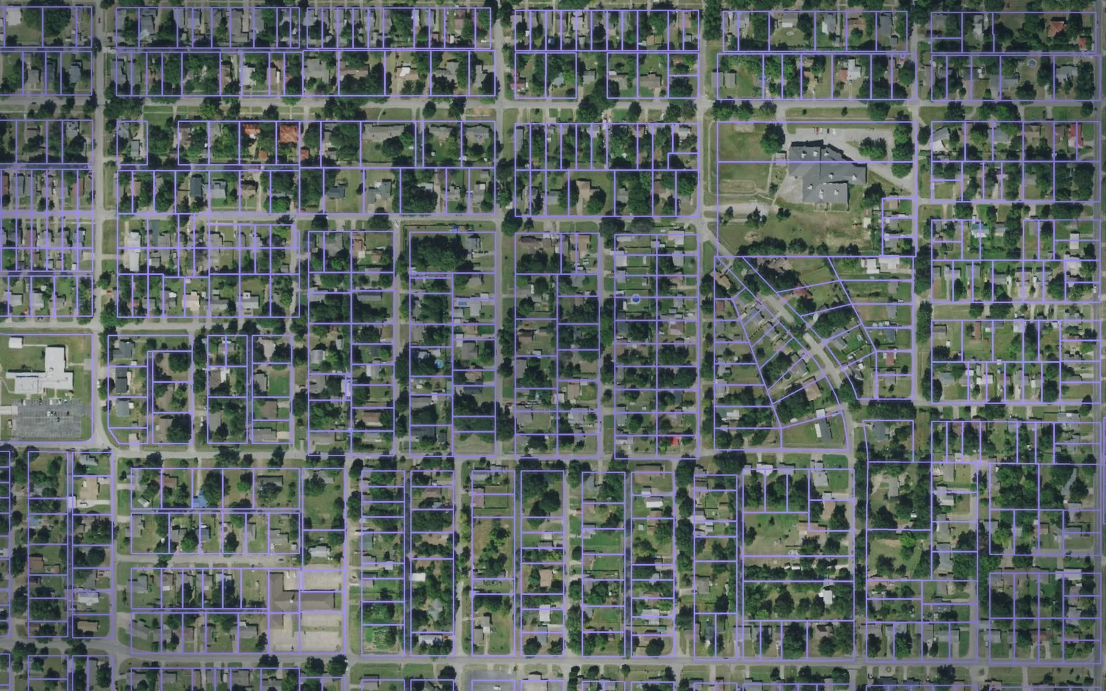 Parcel boundaries over aerial imagery of Okmulgee County, Oklahoma