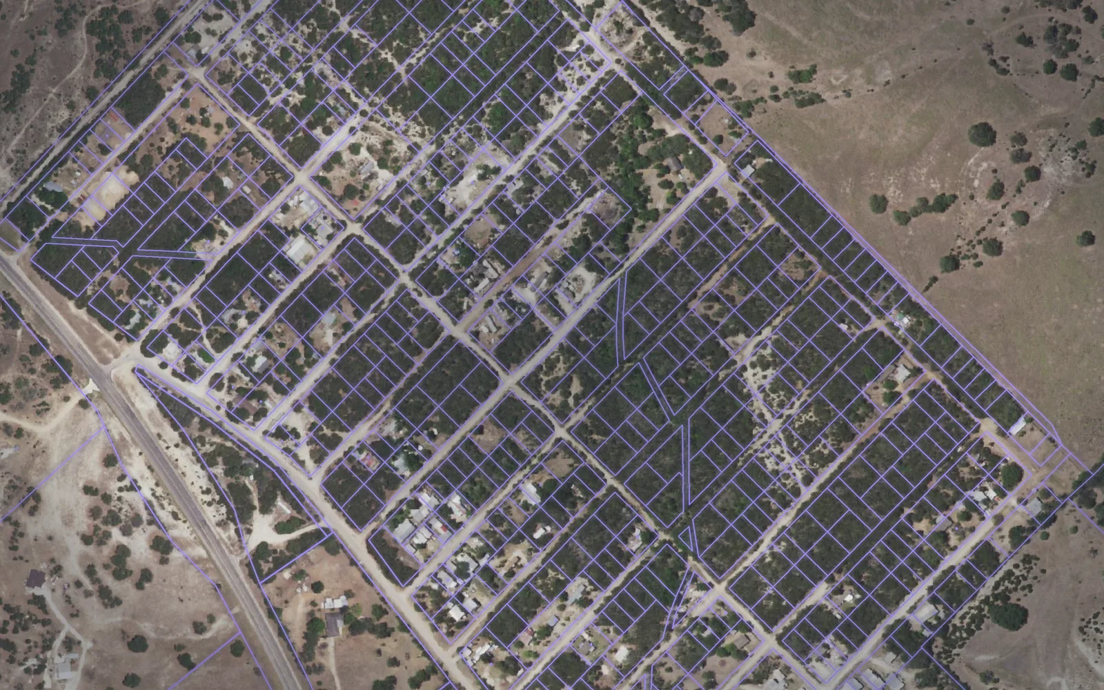Parcel boundaries over aerial imagery of Bandera County, Texas