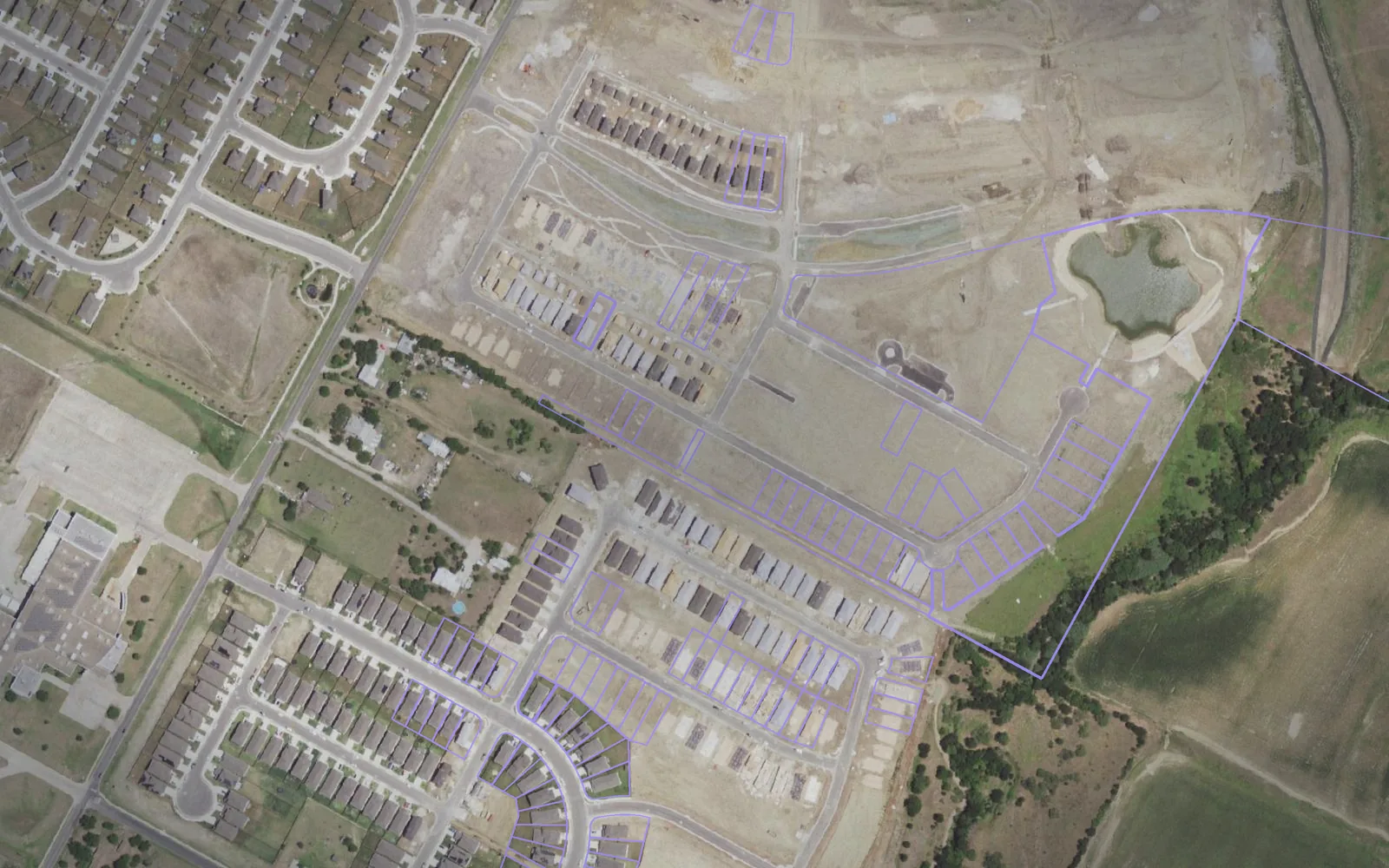 Parcel boundaries over aerial imagery of Bastrop County, Texas