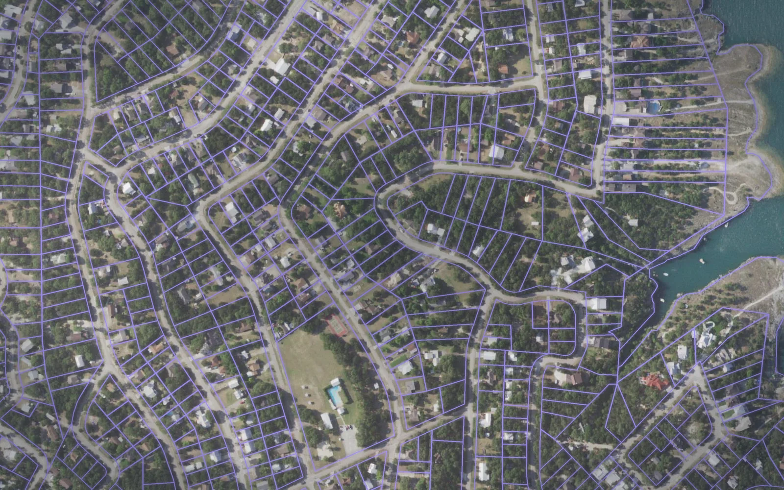 Parcel boundaries over aerial imagery of Comal County, Texas