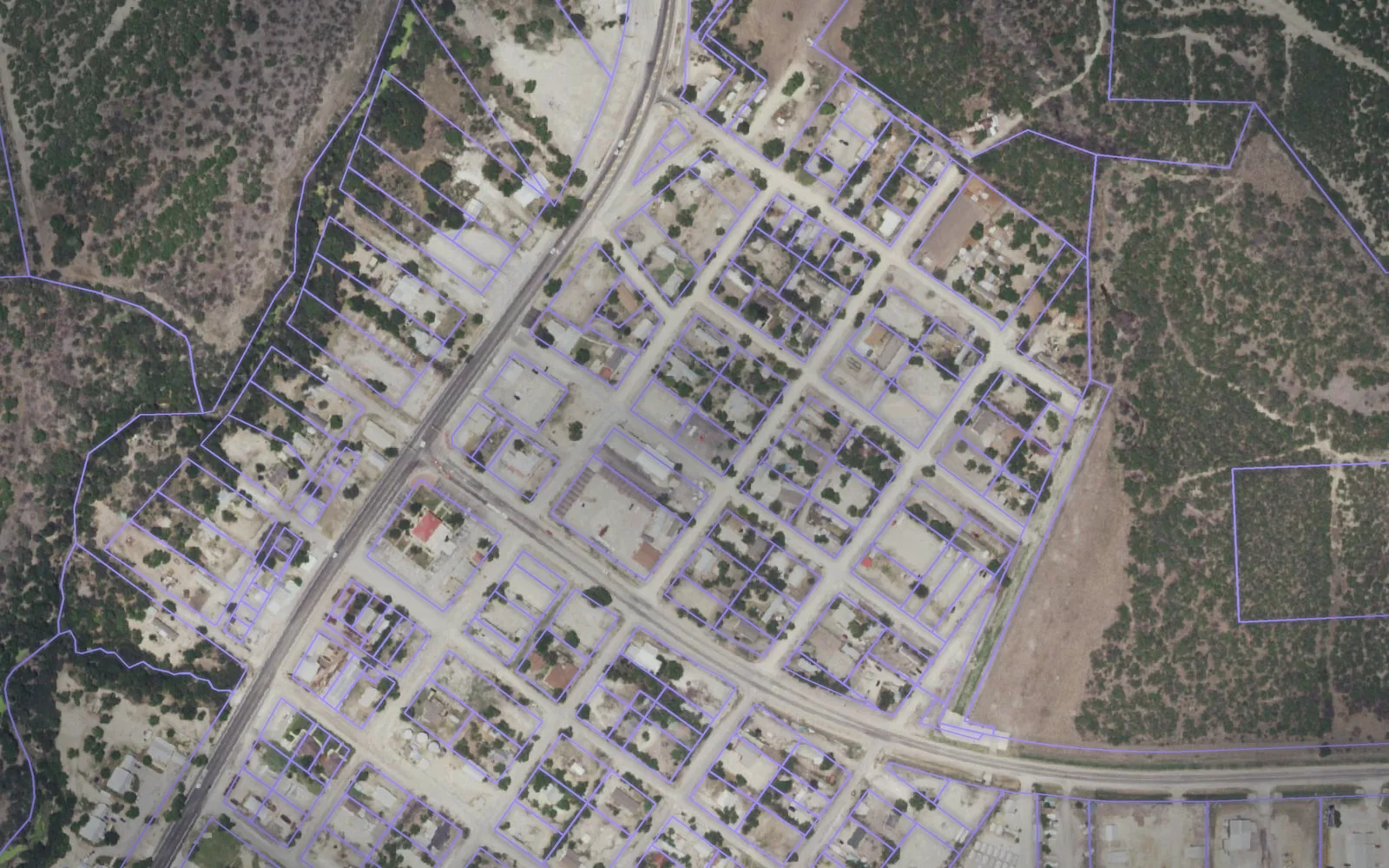 Parcel boundaries over aerial imagery of McMullen County, Texas