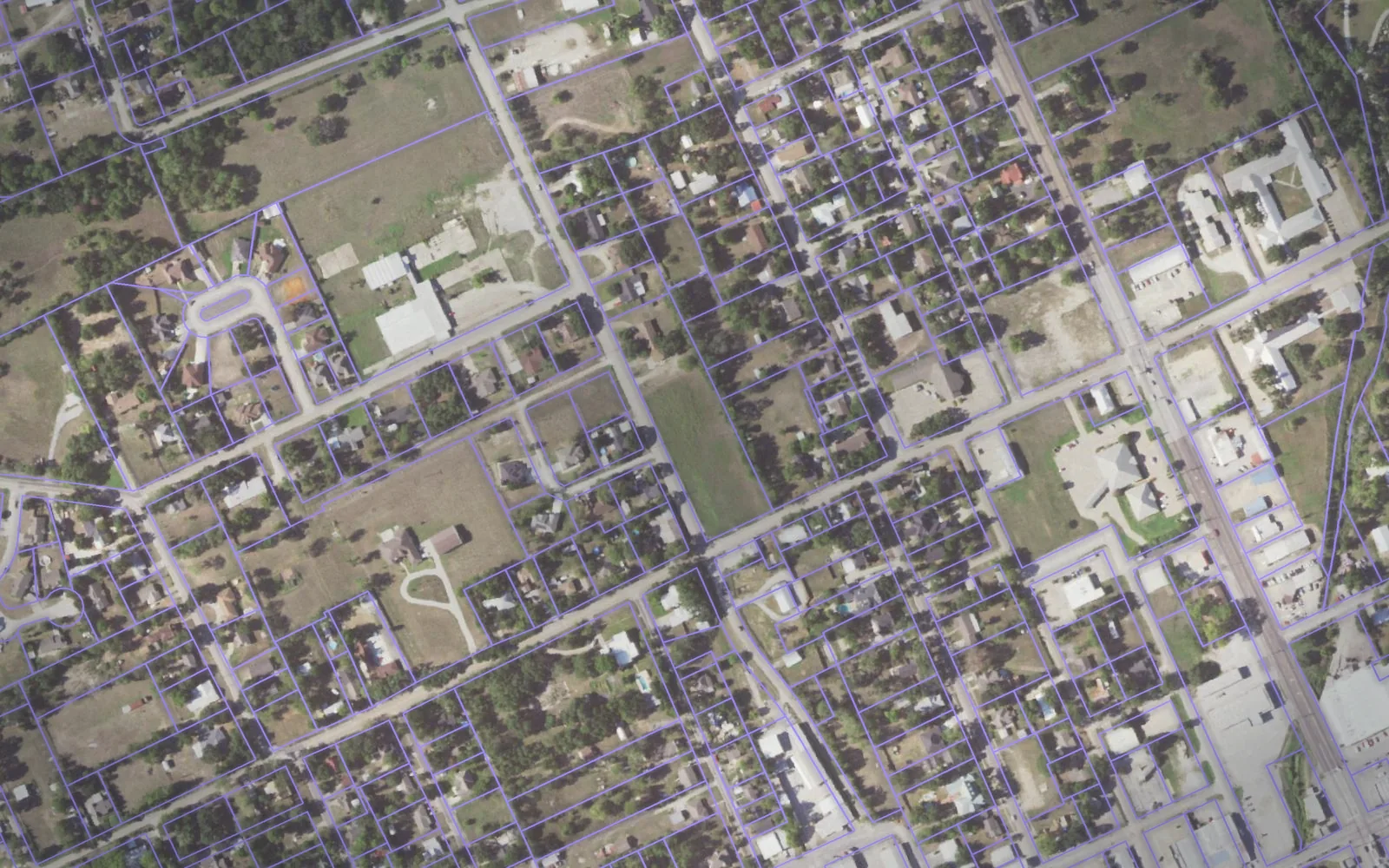 Parcel boundaries over aerial imagery of Madison County, Texas