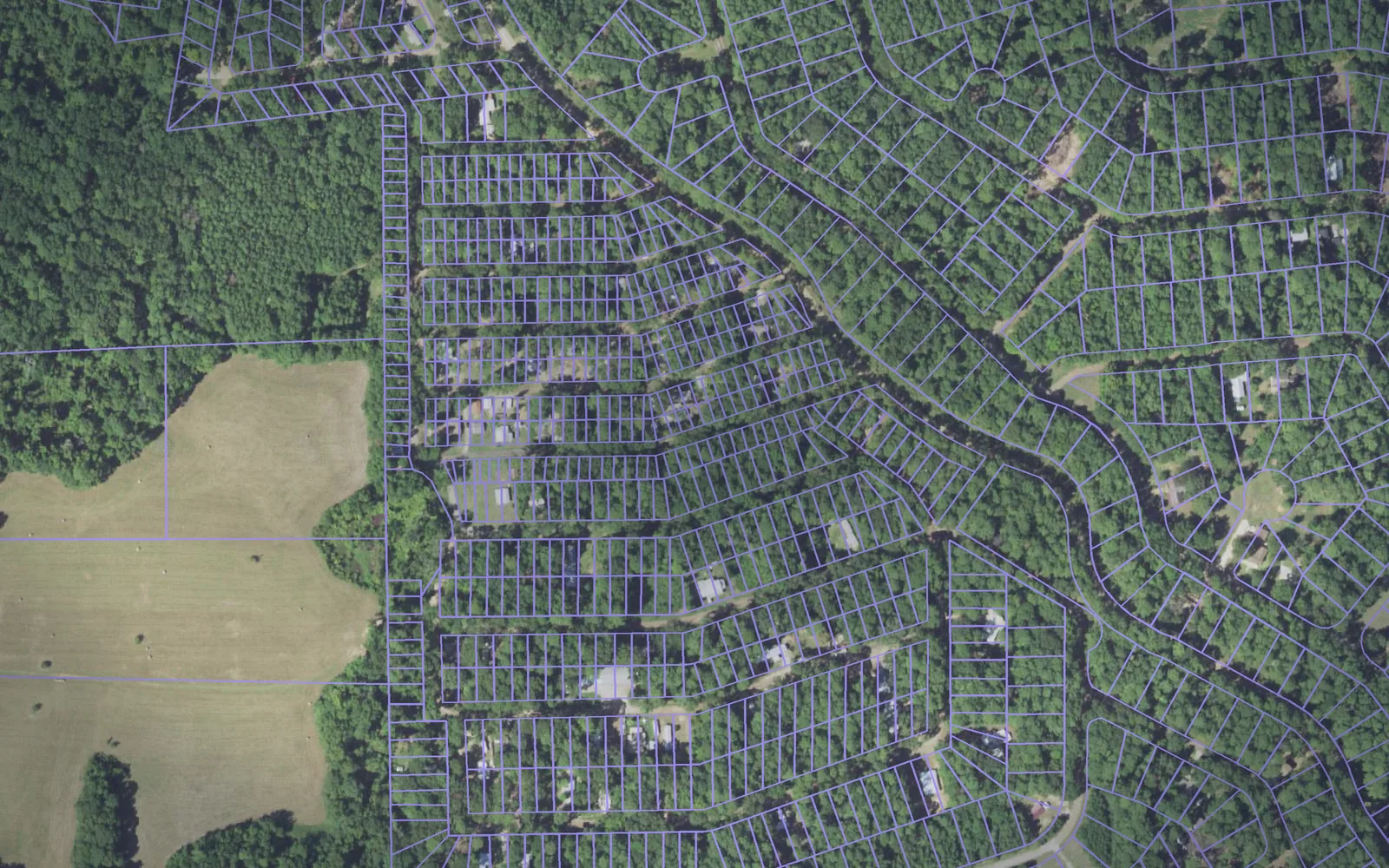 Parcel boundaries over aerial imagery of Sabine County, Texas