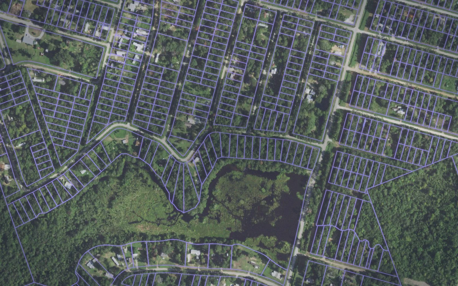 Parcel boundaries over aerial imagery of San Jacinto County, Texas