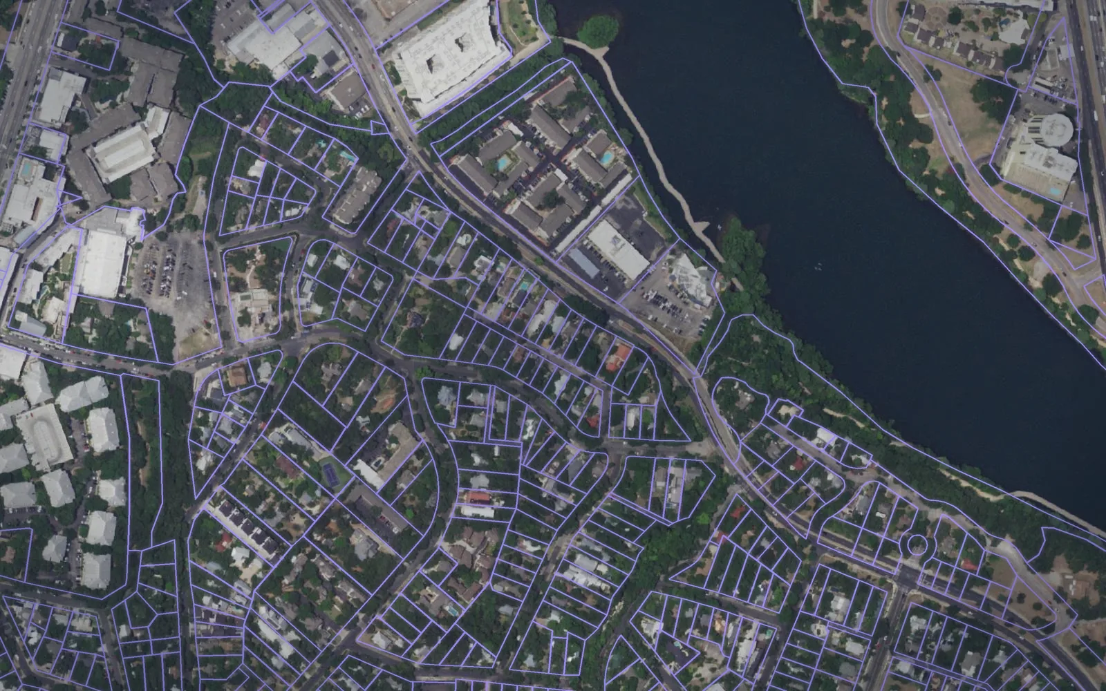 Parcel boundaries over aerial imagery of Travis County, Texas
